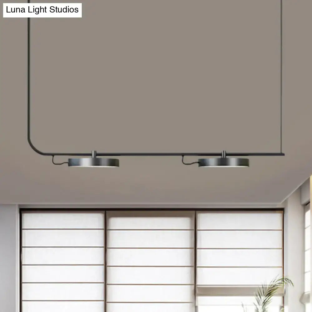 Modern chandelier DecorBites™ with two brushed metal fixtures on black rod for dining room lighting and maximum bulb wattage