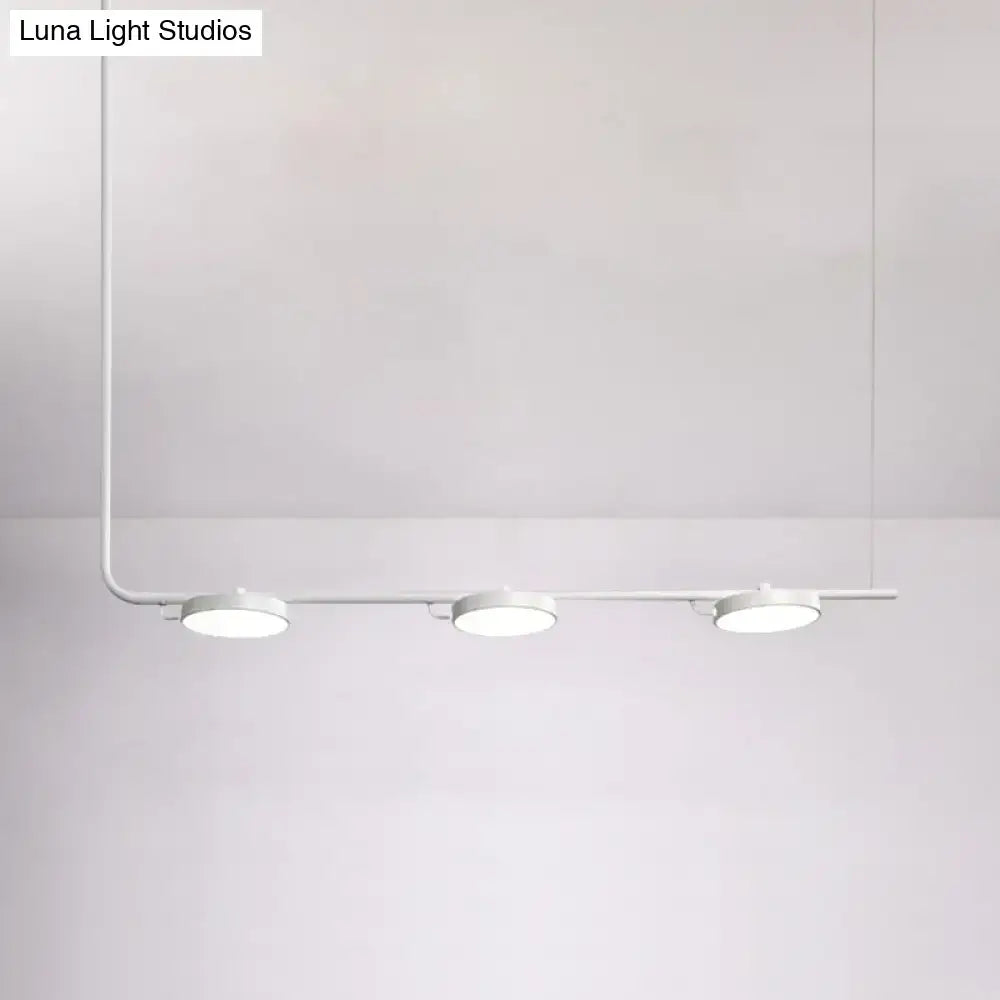 Minimalist white led track light with three circular fixtures on a sleek metal arm for modern chandelier dining room lighting with maximum bulb wattage
