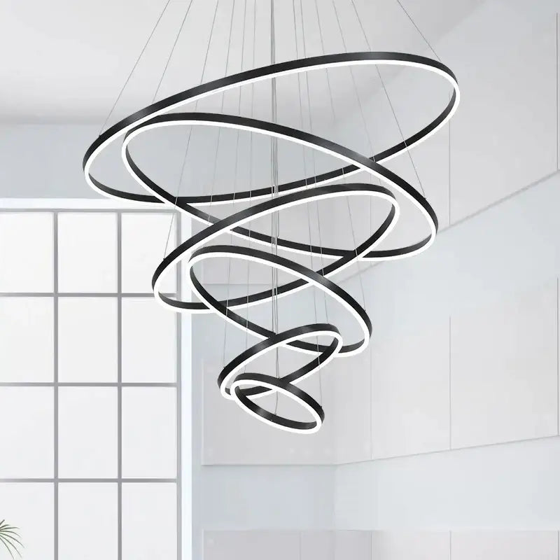 Modern black and white circle ring art chandelier with sleek interlocking rings for staircase lighting decorbites circle ring