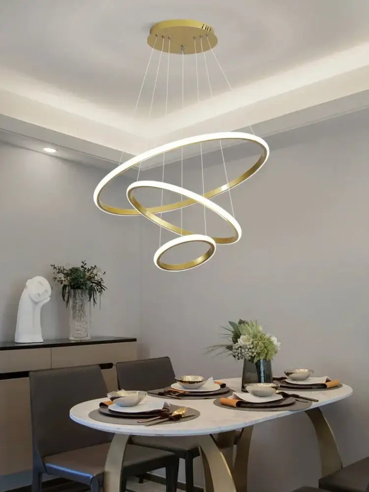 Gold-toned modern led circles chandelier pendant lamp with three interlocking rings for living room decorbites circles chandelier