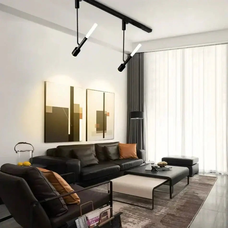 Modern black and white cob pendant spotlight with sleek angular design and white led bulbs for living room lighting