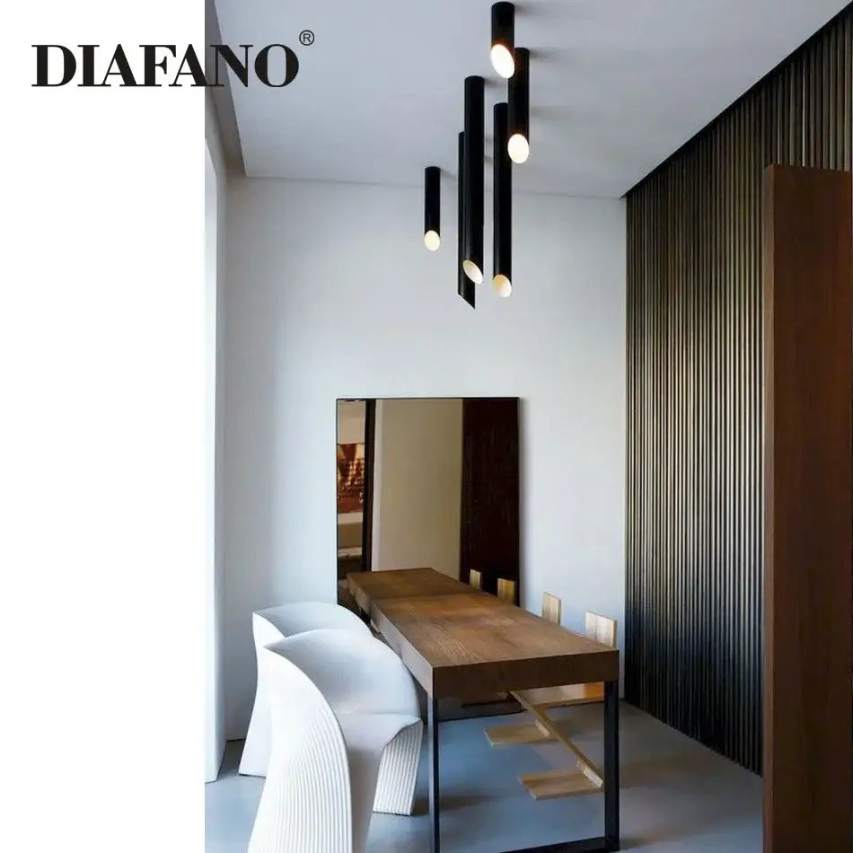 Modern black and white cylindrical led ceiling light with warm glowing bulbs and ceiling light cord for kitchen use