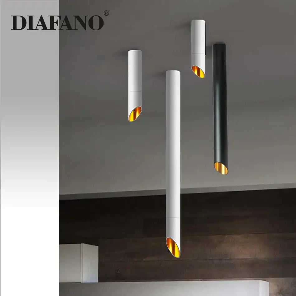 Modern black and white cylindrical led ceiling light with gold-finished interior by diafano for kitchen lighting