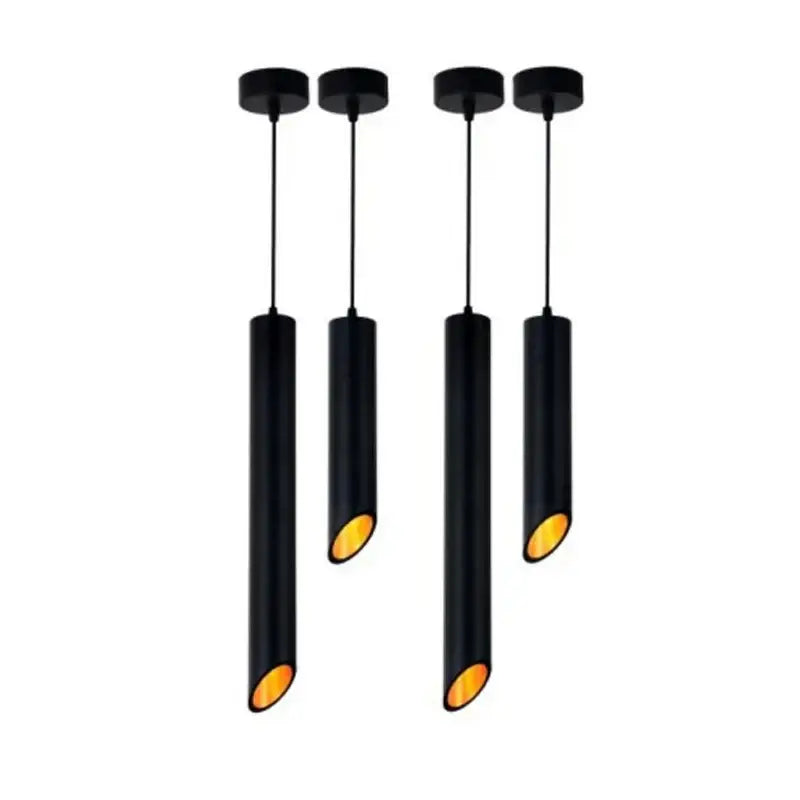 Set of four sleek black cylindrical led ceiling lights with warm yellow glow featuring ceiling light cords for kitchen use
