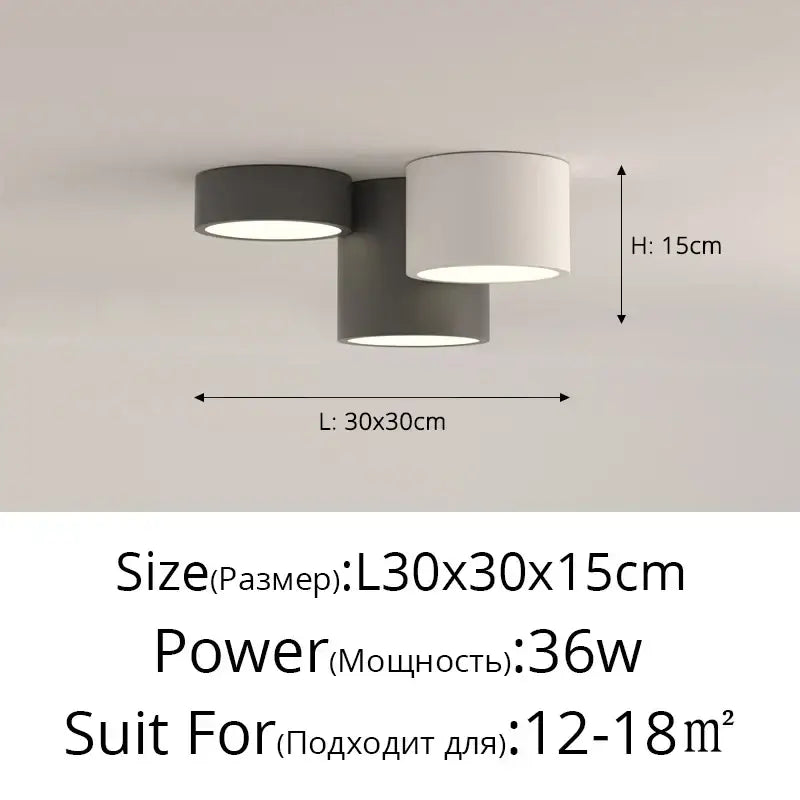 Modern black and white decorbites geometric chandelier with three matte gray and white cylindrical shades for bedrooms