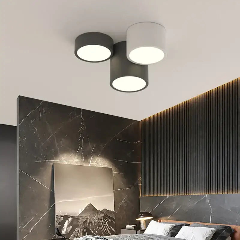 Modern black and white decorbites geometric chandelier with matte black cylindrical shades for bedroom lighting