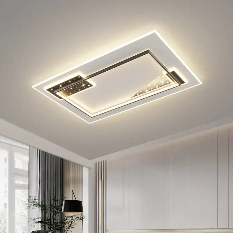 Modern black and white decorbites living lamp chandelier with a sleek white frame black trim and warm led lighting effects