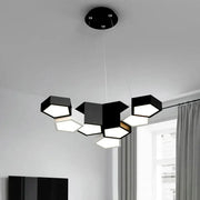 Modern black white diamond led chandelier featuring a hexagonal pendant light with illuminated geometric shades for decorbites black white rooms