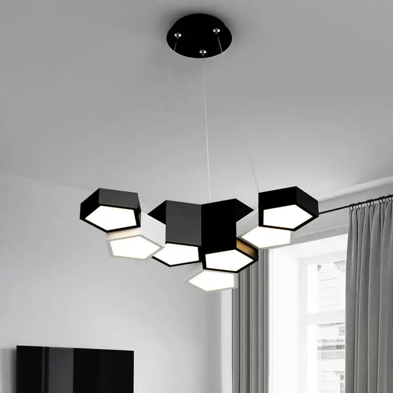 Modern black white diamond led chandelier featuring a hexagonal pendant light with illuminated geometric shades for decorbites black white rooms