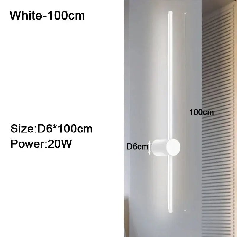 A sleek white 100cm tall minimalist dimmable led wall sconce with cylindrical base for modern bedroom wall lights decorbites