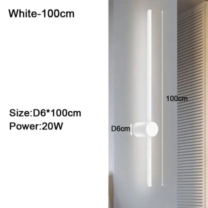 A sleek white 100cm tall minimalist dimmable led wall sconce with cylindrical base for modern bedroom wall lights decorbites