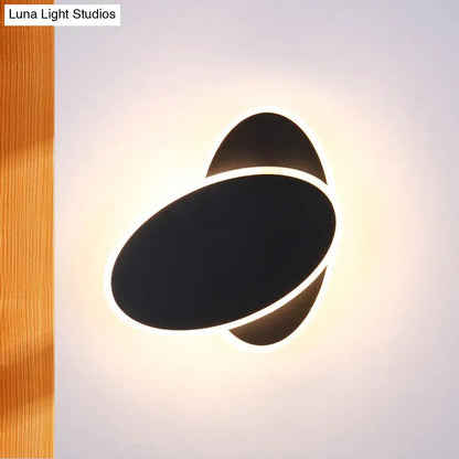 Modern black and white double oval wall sconce lamp with glowing led ring for double oval bedside lighting
