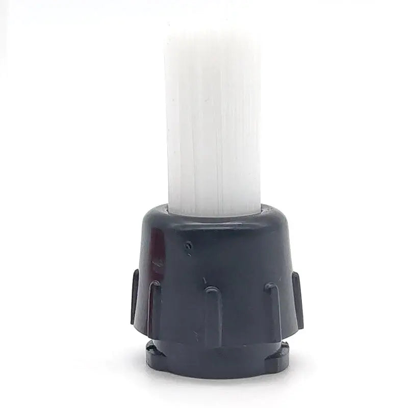White plastic espresso machine brush with black plastic base for decorbites espresso machine cleaning tool