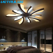 Modern black and white flower led chandelier with sleek metallic accents for living room decor by decorbites led chandelier