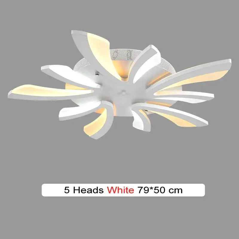 Modern black and white flower led chandelier with five petal arms emitting warm yellow glow decorbites led chandelier