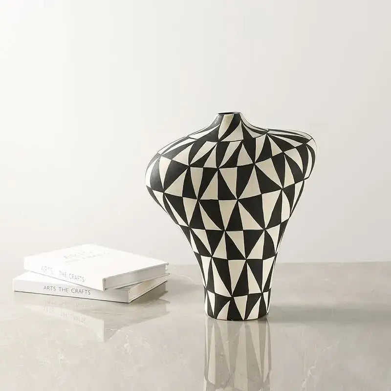 A sleek black and white geometric diamond ceramic vase with modern triangular pattern for living room decorbites decor