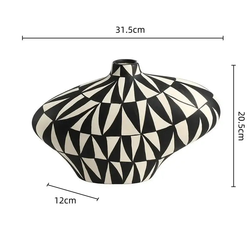 A sleek modern ceramic vase with a black and white geometric diamond pattern for living room decorbites decor