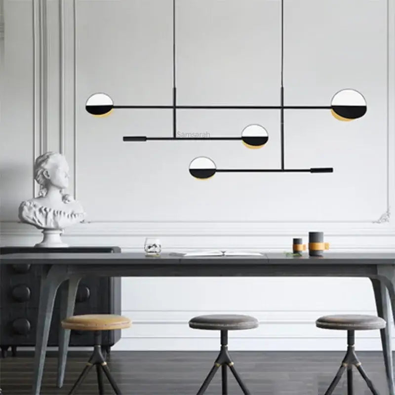 Modern black and white geometric line pendant lamp with gold accents for dining room decorbites geometric line design