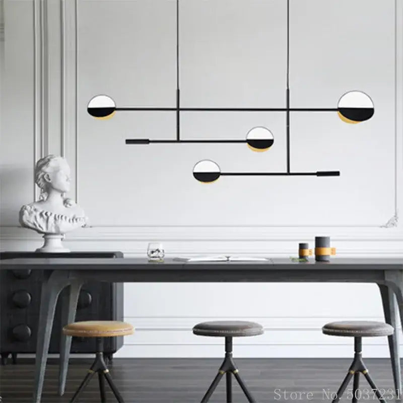 Modern black and white geometric pendant lamp with gold accents made of decorbites geometric iron for kitchen decor