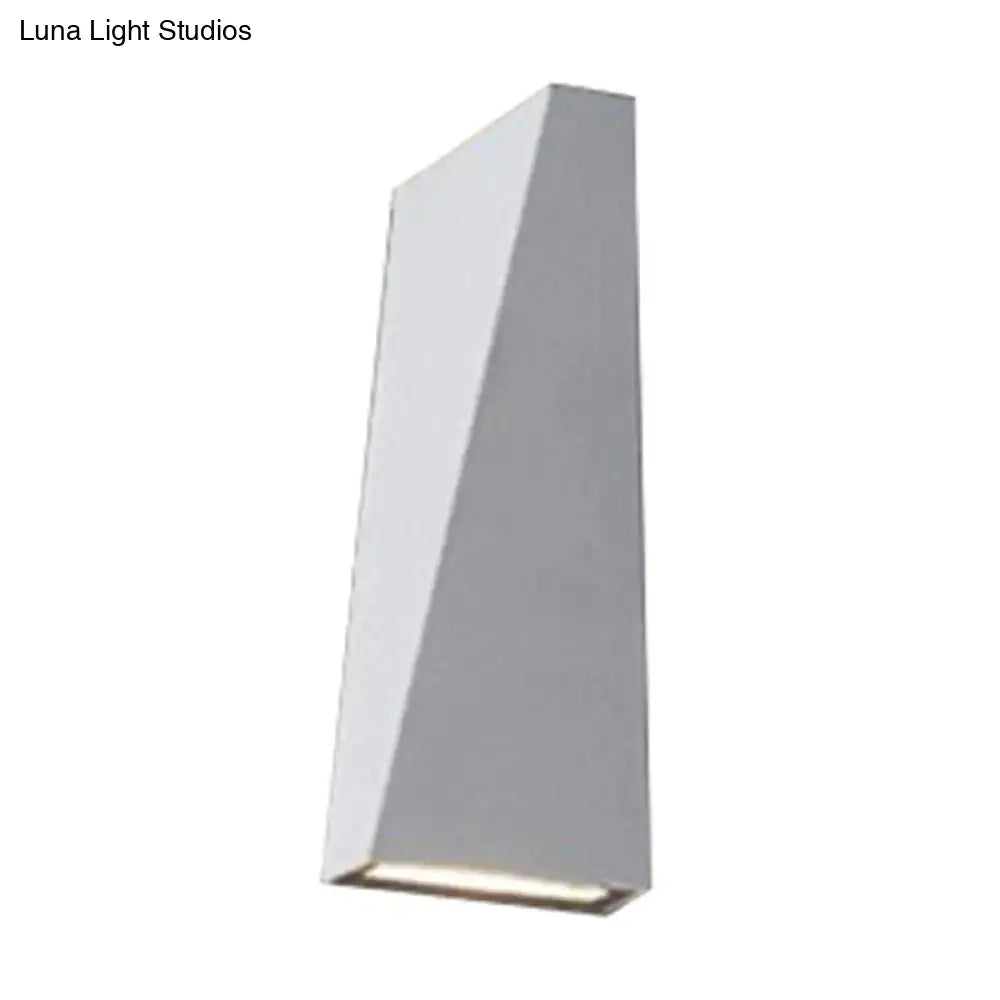 Modern black and white nord wall sconce with geometric angular design and minimalist finish for bedroom wall lamp