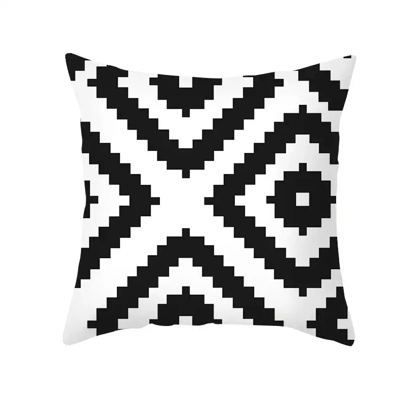 Modern black and white geometry letters cushion cover featuring bold pixelated design for home decor and decorbites black geometry style