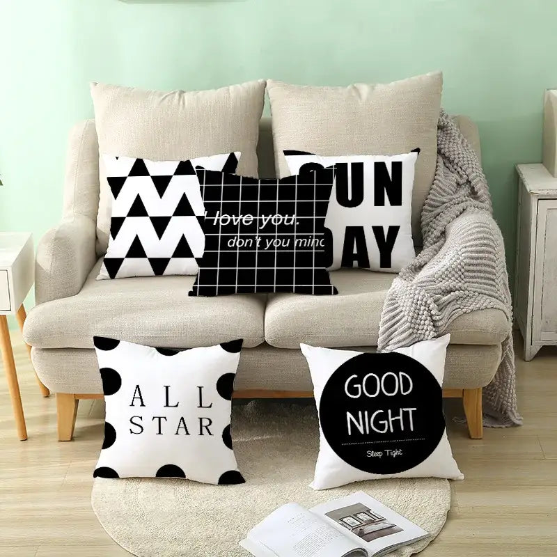 Modern black and white geometry letters cushion cover with black and white geometric patterns for home decor by decorbites black geometry
