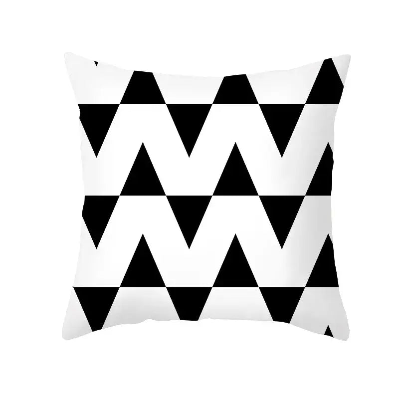 Modern black and white geometry letters cushion cover featuring black and white geometric triangle pattern for home decor