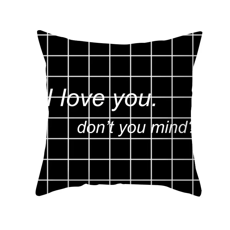 Modern black and white geometry letters cushion cover with black throw pillow and white grid pattern for home decor decorbites black geometry