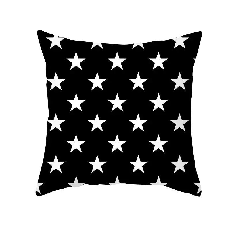 Modern black and white geometry letters cushion cover with black throw pillow featuring white five-pointed stars for home decor