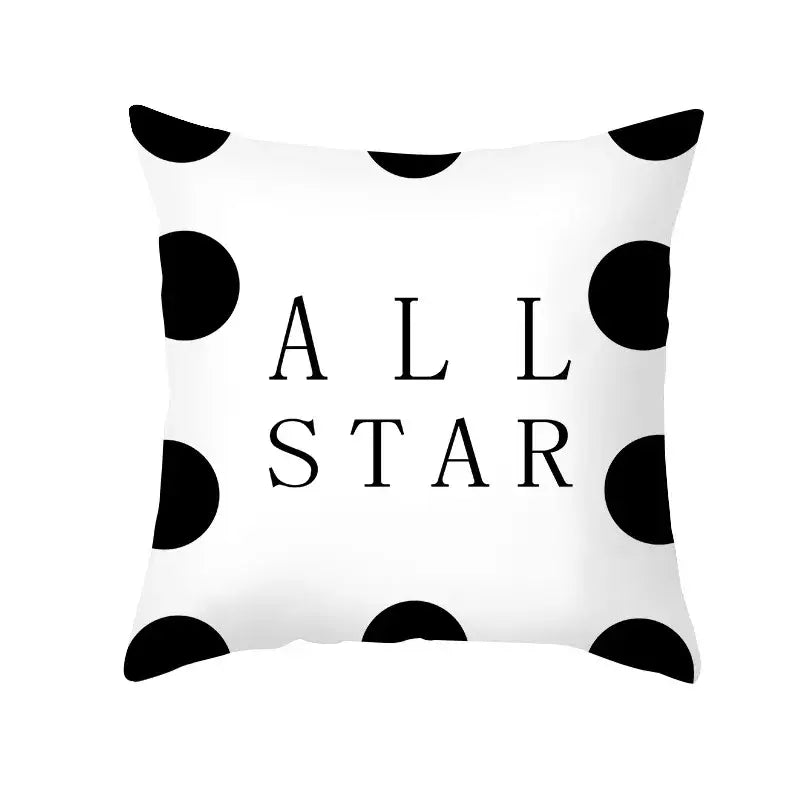 Modern black and white geometry letters cushion cover with all star print and black polka dots for home decor