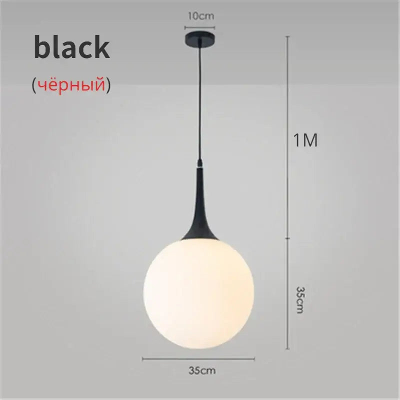 Modern black and white glass ball led pendant lights featuring a matte black spherical pendant light with frosted glass globe