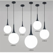Modern black and white glass ball led pendant lights with sleek black metal stems for living room decorbites pendant lights