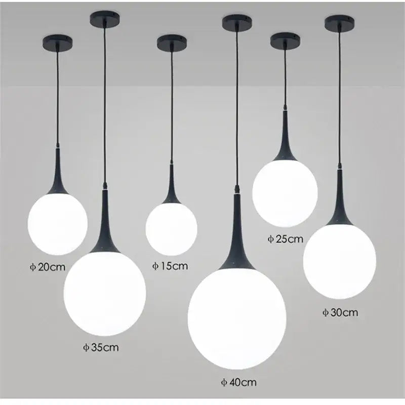 Modern black and white glass ball led pendant lights with sleek black metal stems for living room decorbites pendant lights