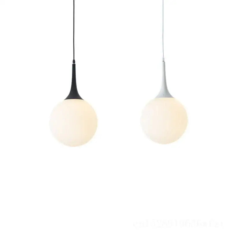 Modern black and white glass ball led pendant lights with spherical frosted glass globes for living room decorbites