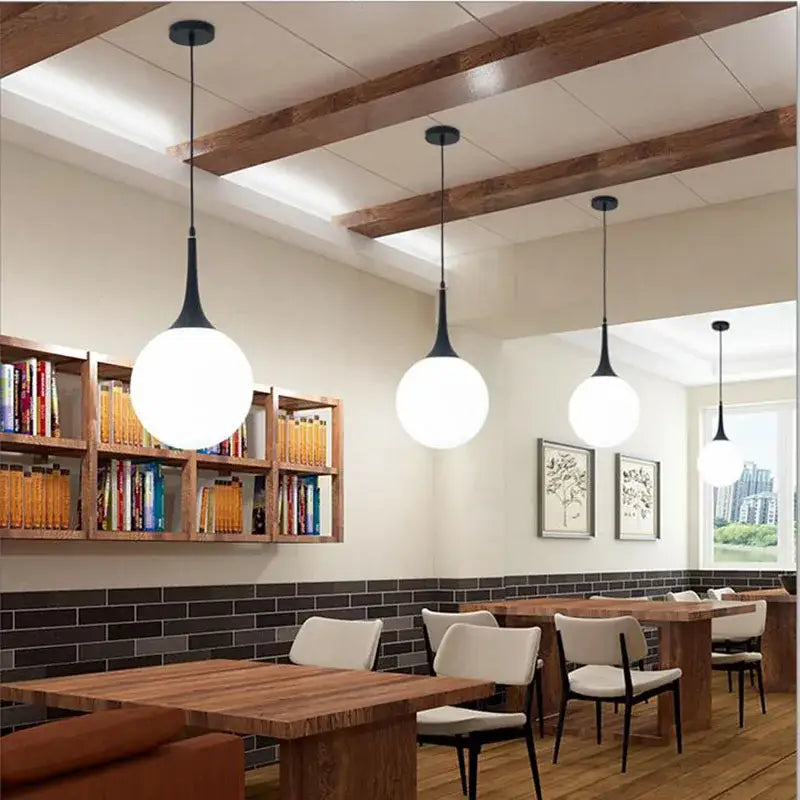 Modern black and white decorbites glass ball pendant lamp with sleek black stems for dining room lighting