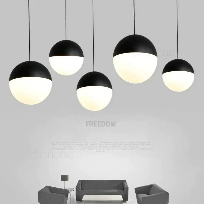 Modern black and white glass ball pendant lights with matte and glossy finishes for kitchen decorbites pendant lights