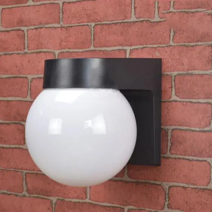 Modern black and white globe wall lamp with white glass globe on black metal bracket for outdoor porch light