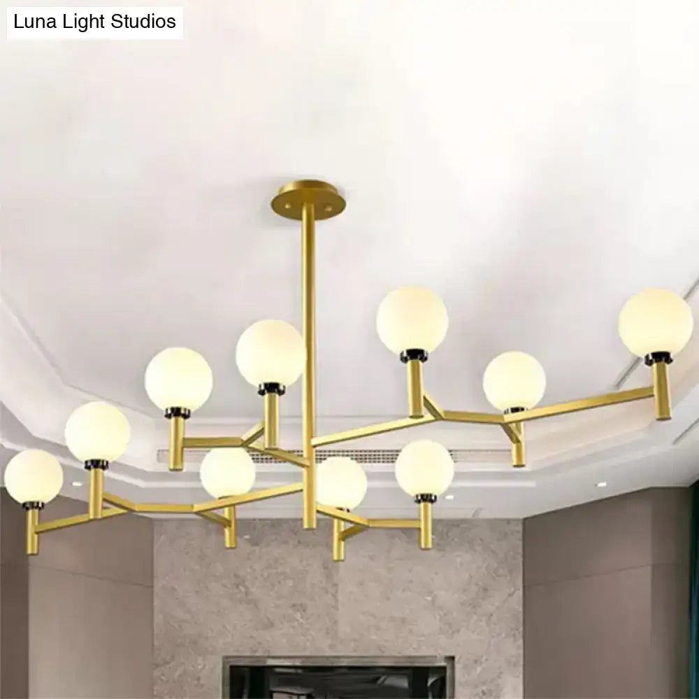 Gold-toned decorbites modern 10-head orbit chandelier pendant with white frosted glass globes in black white gold finish