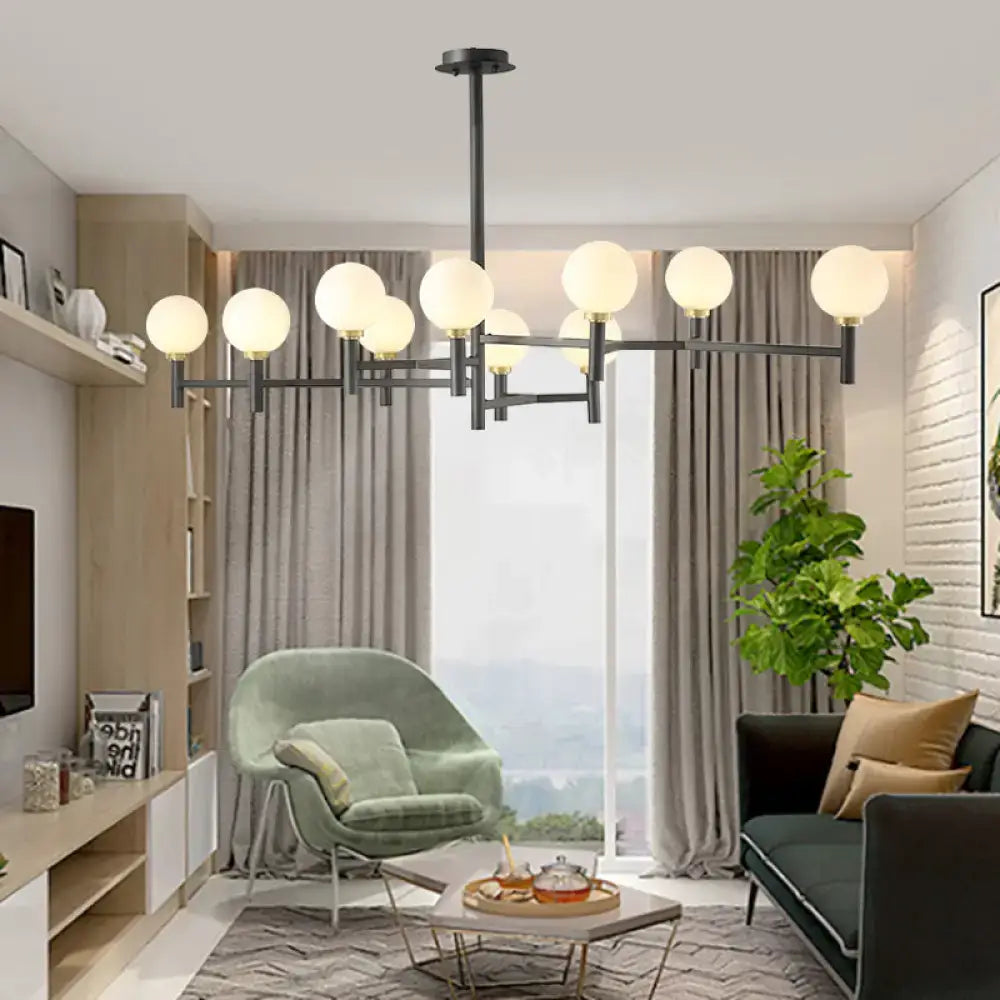 DecorBites modern 10-head orbit chandelier pendant in black white gold with white glass globes for living room lighting