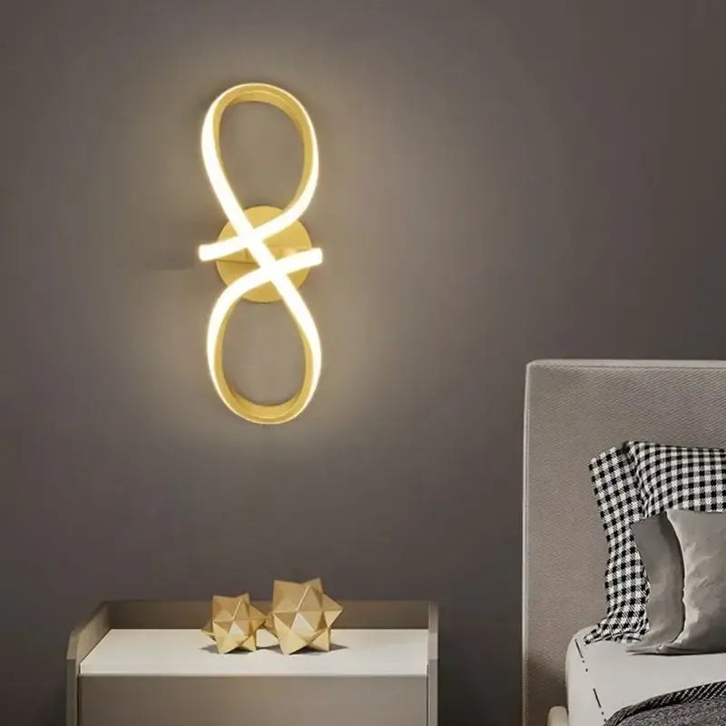 Gold nordic led wall sconce with modern infinity loop design for elegant bedroom decorbites gold nordic lighting