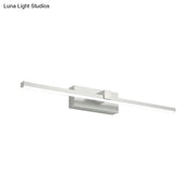 Modern black and white iron stick led bathroom lamp with sleek rectangular design and minimalist bulb base mounting bracket
