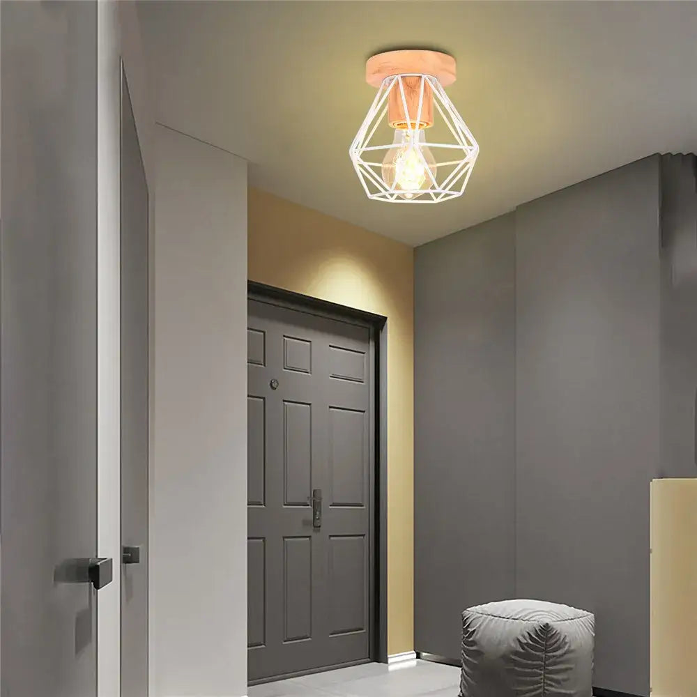 Modern black and white iron wood e27 ceiling light with warm-toned geometric wireframe and wooden base by decorbites iron wood