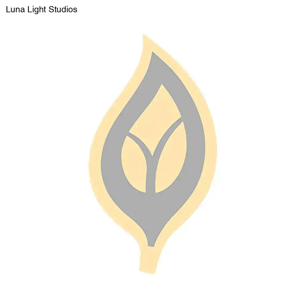 Modern black and white leaf sconce light wall lamp with a stylized soft yellow and gray leaf logo and central vein design