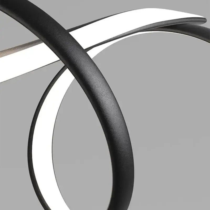Modern black and white led chandelier with sleek curved design for dining room pendant light by decorbites black modern