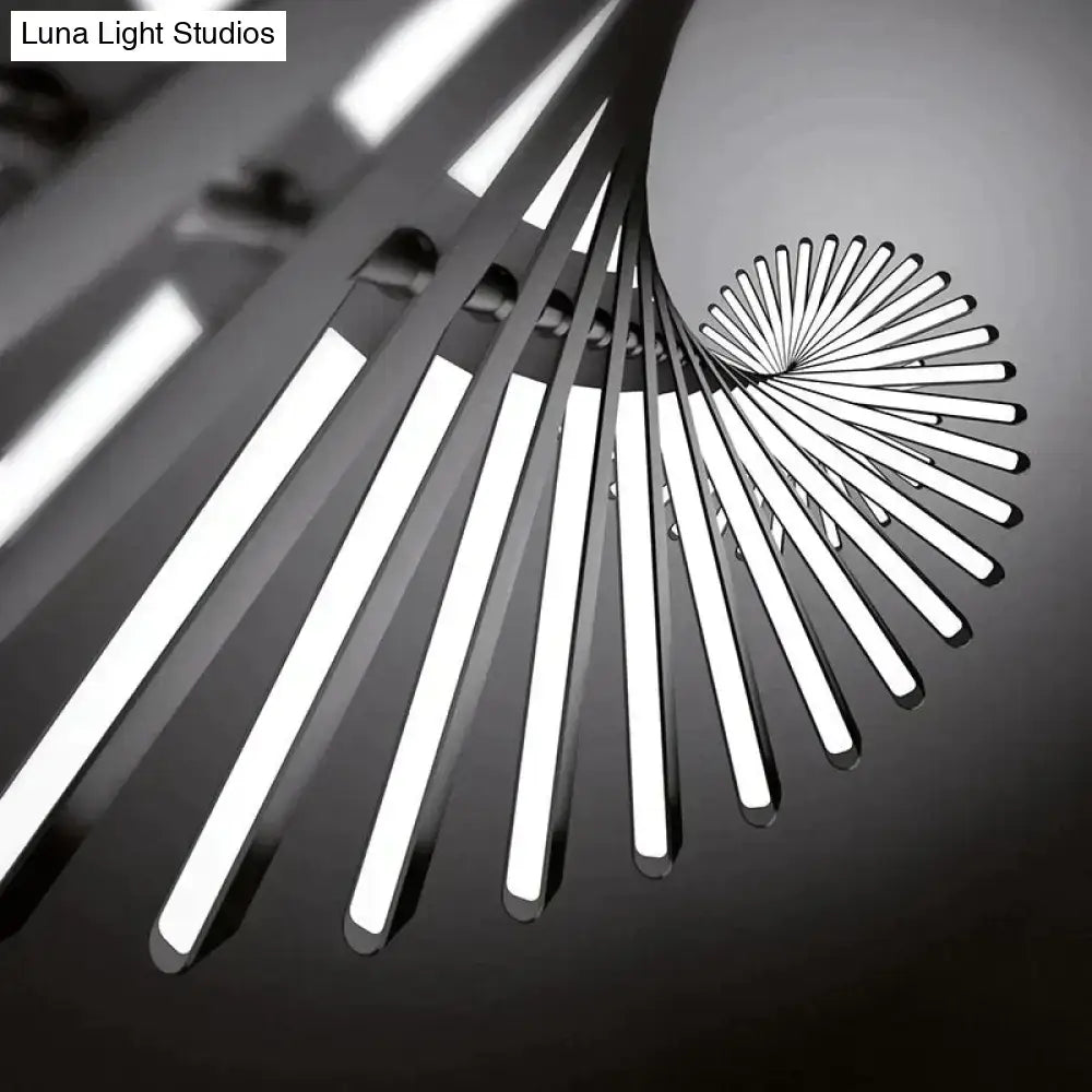 Decorbites modern led chandelier with sleek white rectangular bars radiates from central circular fixture in black and white