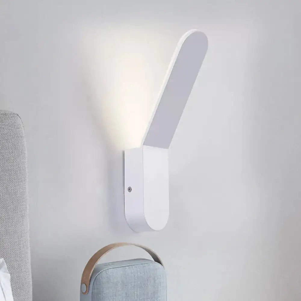 Modern black and white oval shape led lighting wall sconce with sleek minimalist design and soft ambient lighting