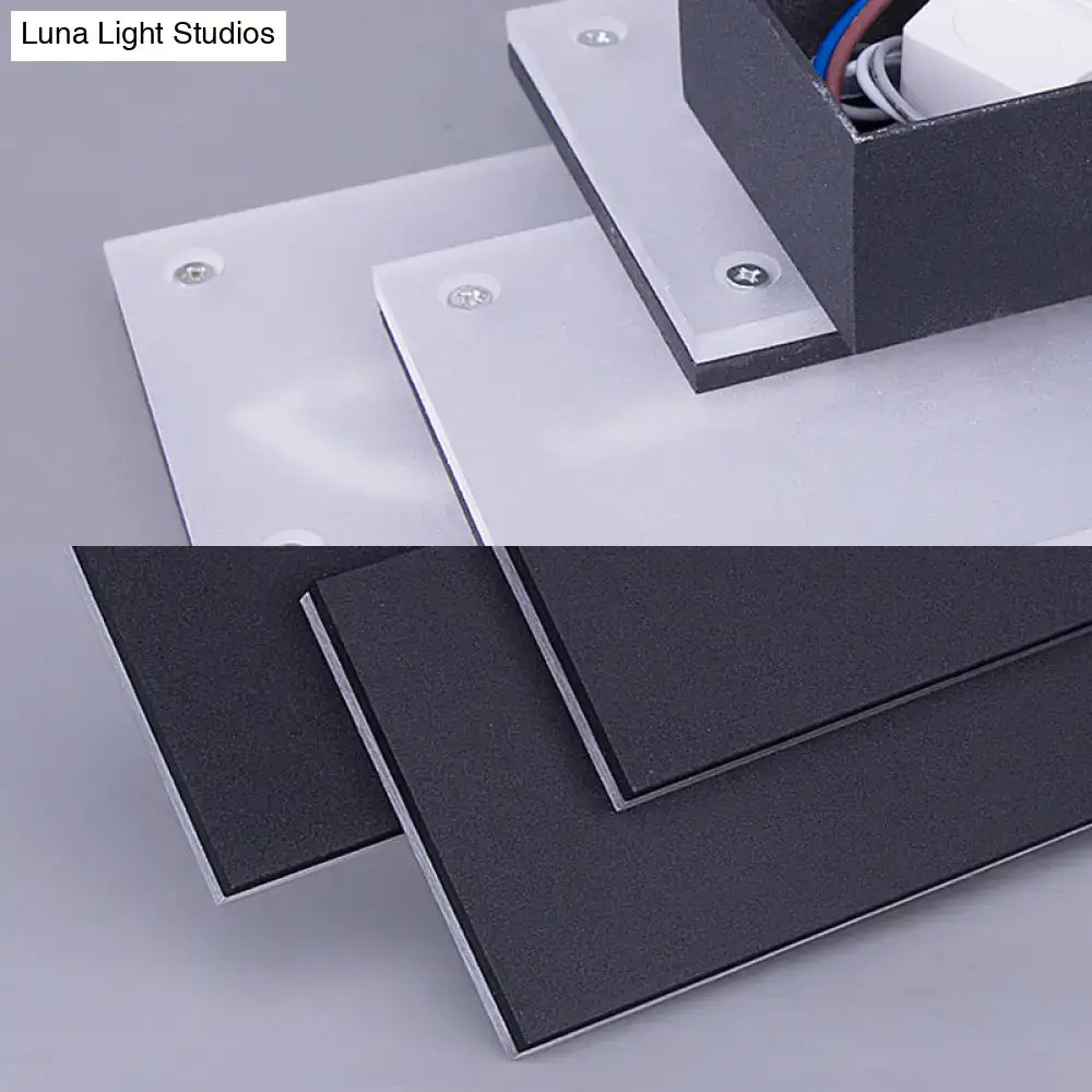 Modern black and white led wall lamp with sleek minimalist design and 5in fixture height for bedroom use