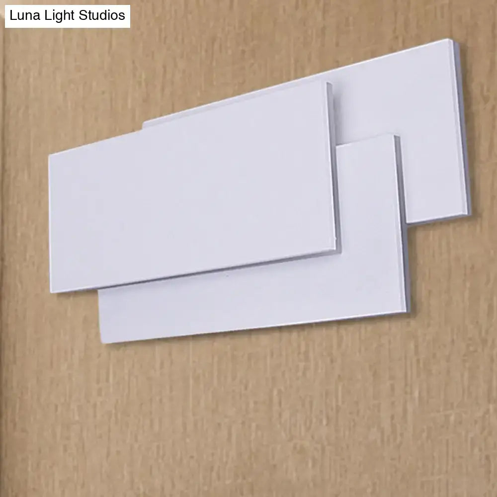 White rectangular panels with smooth matte finish on modern black white led wall lamp fixture height 5in for bedroom