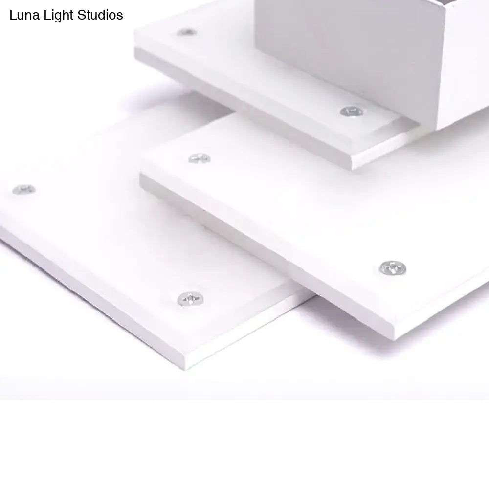Modern black and white wall lamp with white acrylic panels and silver screws fixture height 5in for bedroom use