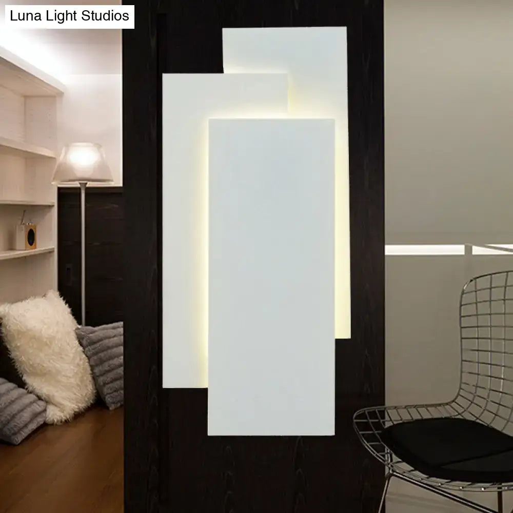 Modern black and white wall lamp with layered minimalist design and 5in fixture height for bedroom ambient lighting